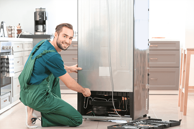 Professional refrigerator water filter replacement in Abu Dhabi - Abu Dhabi Appliance Repair installing new filter cartridge